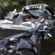 This photo provided by the NTSB via the Florida Highway Patrol shows the Tesla Model S that was being driven by Joshau Brown,who was killed, when the Tesla sedan crashed while in self-driving mode on May 7, 2016. The National Transportation Safety Board said in a preliminary report on July 26 that the Tesla Model S was traveling at 74 mph in a 65-mph zone on a divided highway in Williston, Fla., near Gainesville, just before hitting the side of a tractor-trailer. (NTSB via Florida Highway Patrol via AP)